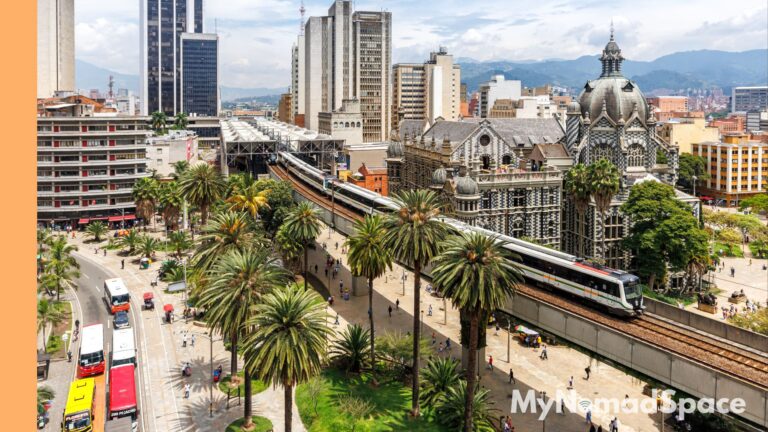 A train on the Medellin Metro line, passing through the city.